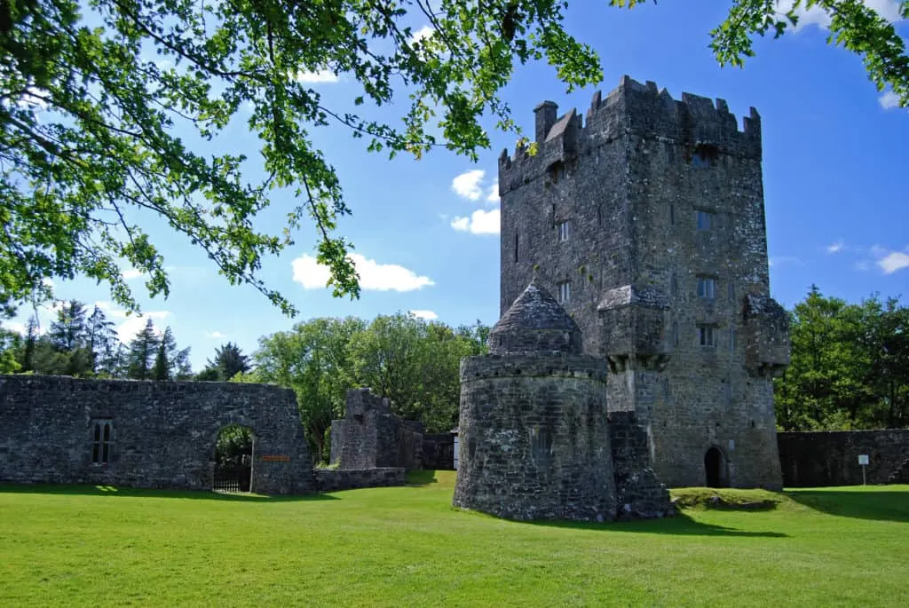 A view of Aughnanure Castle, front facing on a sunny day. 