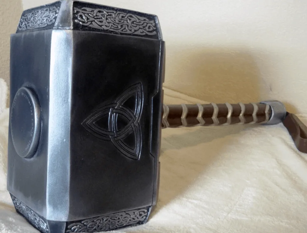 The symbol on Thor's hammer is actually an ancient Celtic Symbol the Triquetra you can see it in this image.