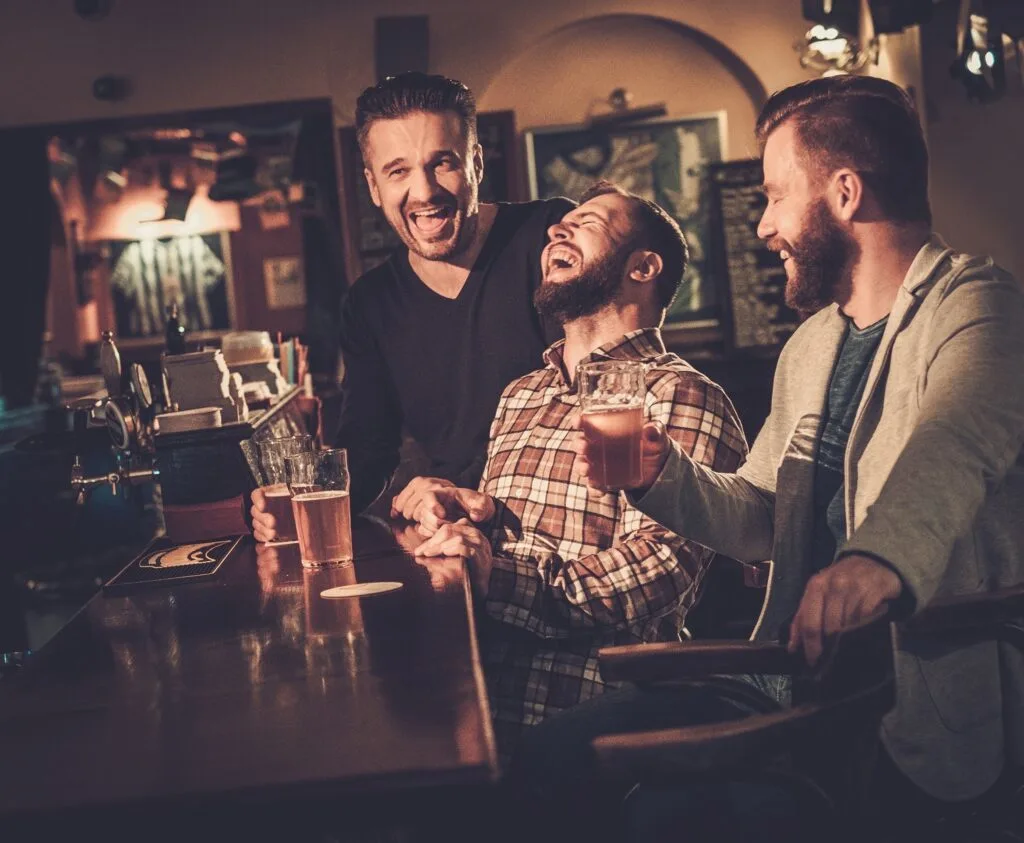 Laughing at Irish jokes in an Irish pub
