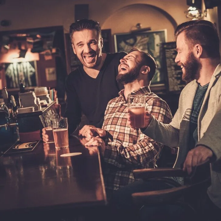 Laughing at Irish jokes in an Irish pub
