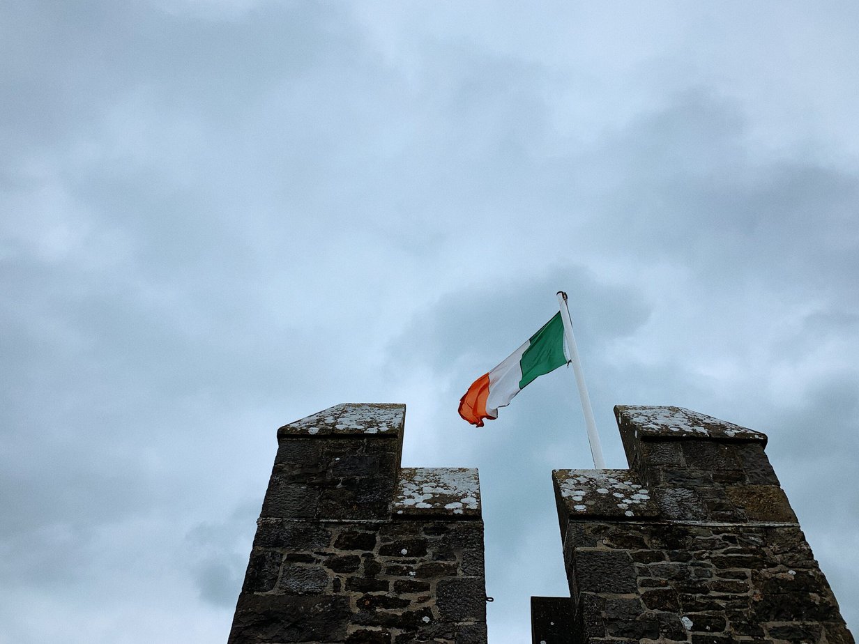 Picture of the incredible Irish flag at Bunratty Castle is a large 15th-century tower house in County Clare, Ireland. 