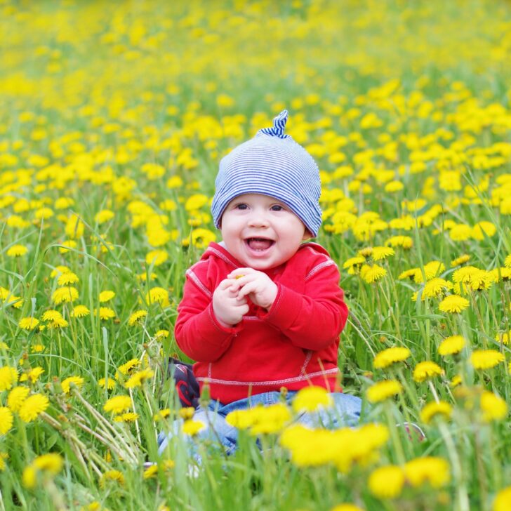 Irish baby in a field, helps you pick from the list of Irish baby names