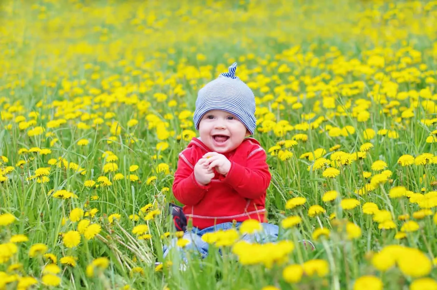 Irish baby in a field, helps you pick from the list of Irish baby names