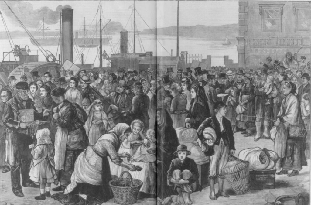 Harper's Weekly 1874 engraving of emigrants with bundles and baskets crowding the quay at Queenstown before sailing for New York