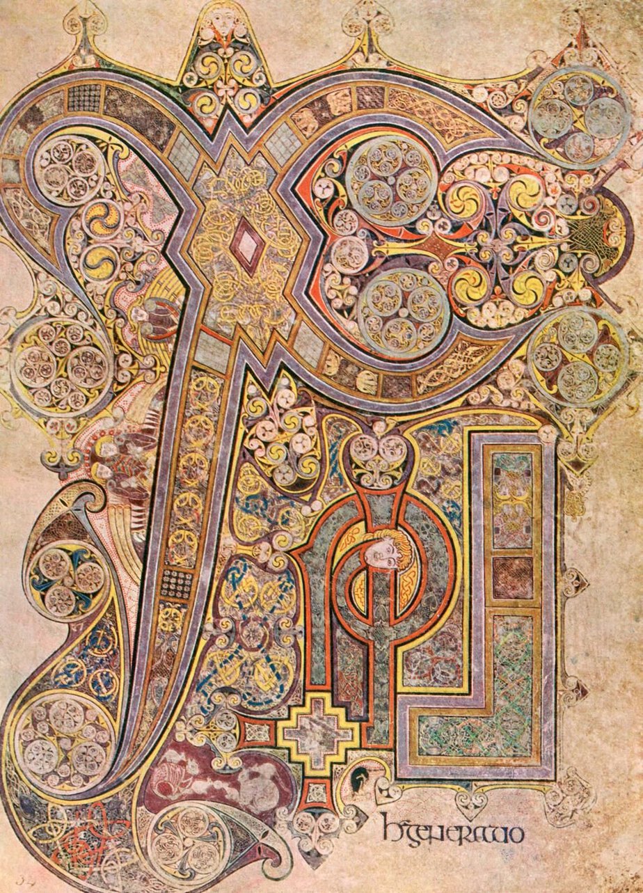 The Chi Rho page of the Book of Kells: a giant decorated X and P fill the page with spirals, knotwork, angels and tiny animals