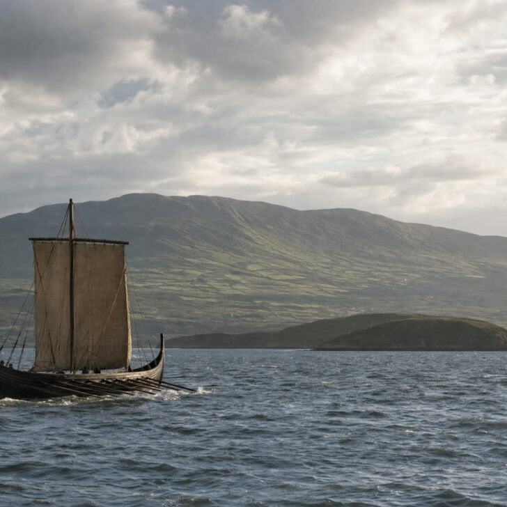 A sixteenth-century Irish galley under sail on Clew Bay, with the mountains of Mayo behind
