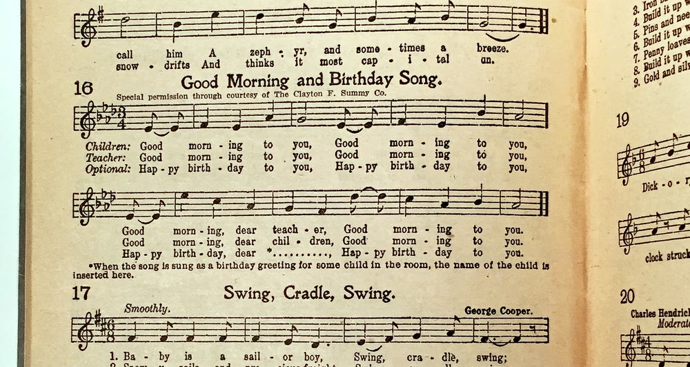 Page of a 1922 songbook showing the music for Good Morning and Birthday Song, with the children's, teacher's and optional birthday words printed under the notes