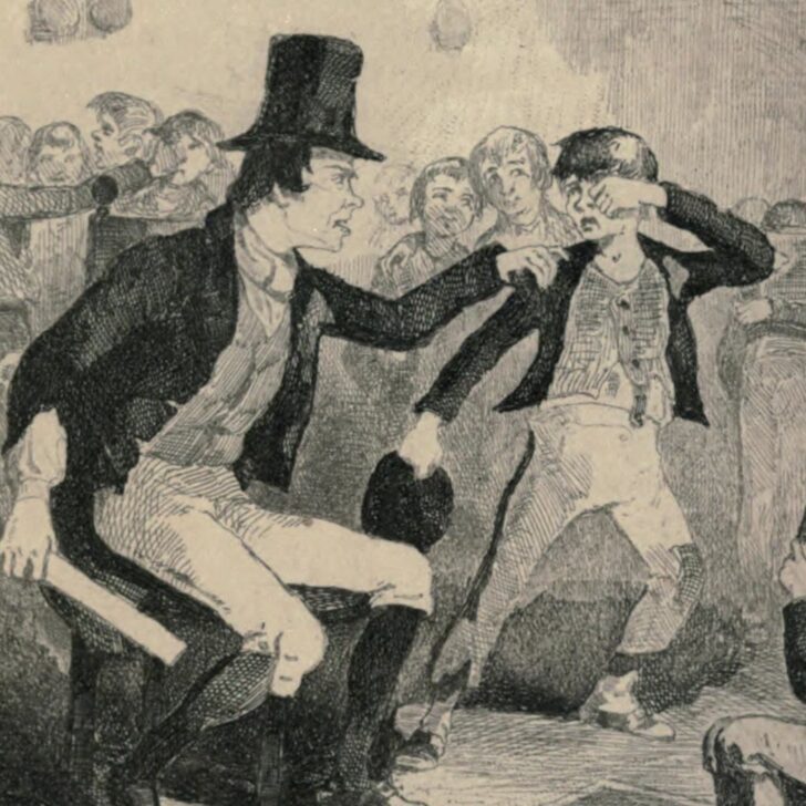 Illustration from William Carleton's 1843 story The Hedge School: a schoolmaster in a top hat grips a pupil by the collar in a crowded cabin classroom