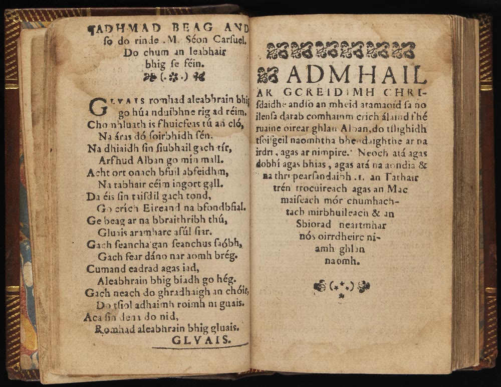 An open sixteenth-century book on a dark background: the left page holds a short poem in Gaelic type, the right page a heading reading Admhail ar gcreidimh above a centred block of text, with printed floral ornaments