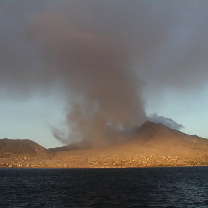 Ash rising from the Soufrière Hills volcano above the sea on Montserrat