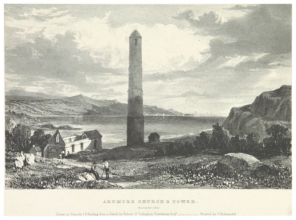 1830 lithograph of the round tower at Ardmore, Co. Waterford, ringed by stone bands, with a ruined church to the left and the bay and hills behind
