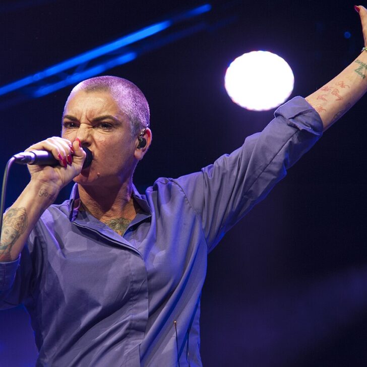 Sinéad O’Connor singing on stage