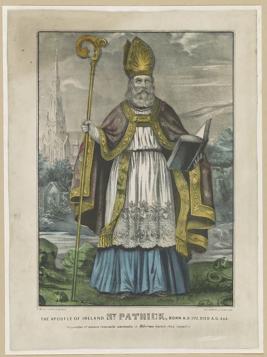 St Patrick snakes legend: 19th-century hand-coloured print of St Patrick in a gold mitre and vestments, holding a crozier and an open book, with snakes and toads in the grass at his feet and a church spire behind