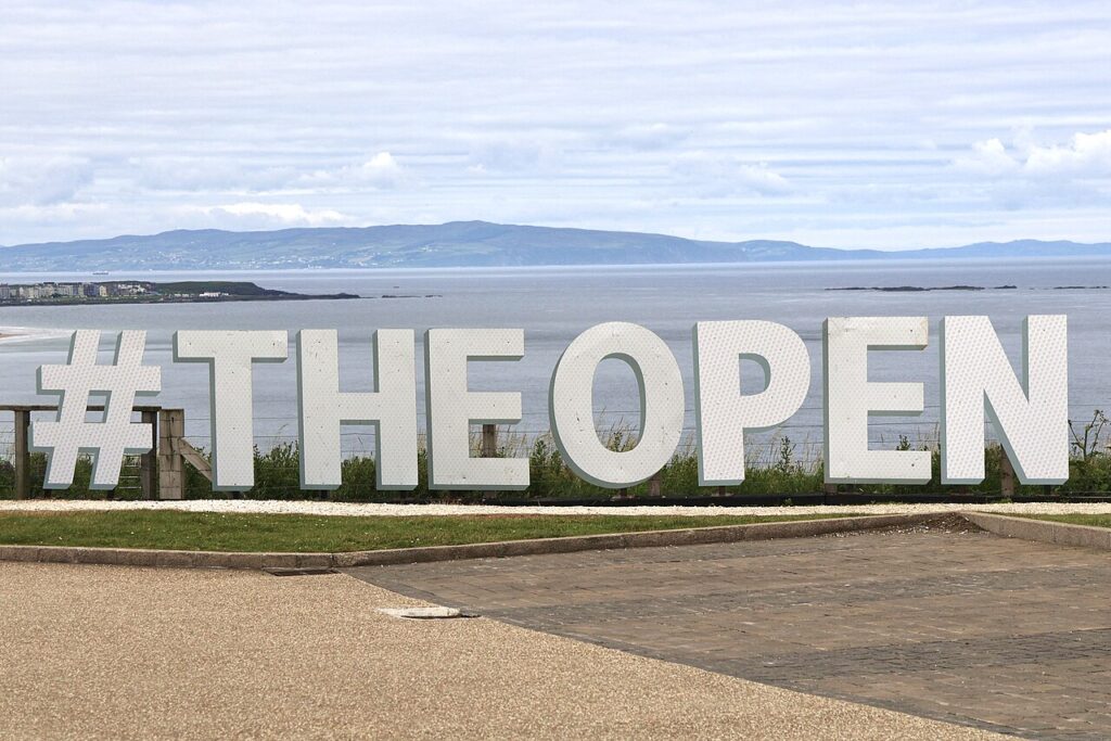 The Open sign at Portrush overlooking the sea