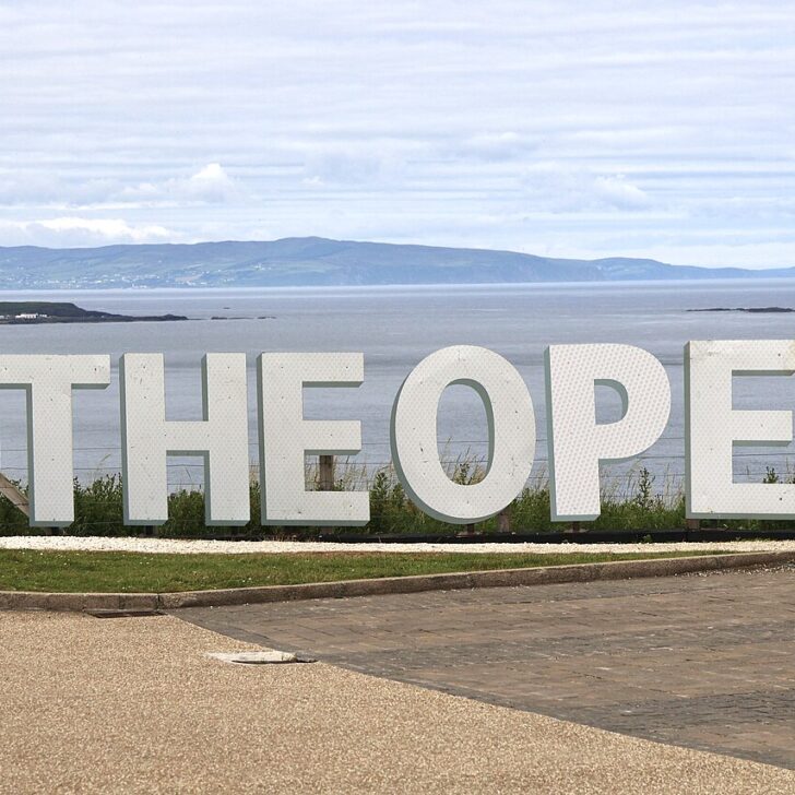 The Open sign at Portrush overlooking the sea